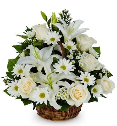 Is someone special on your mind? Let them know they're in your thoughts with this enchanting mix of roses, stargazer lilies, waxflower and daisies...all in white, placed in a charming willow basket. Measures 16