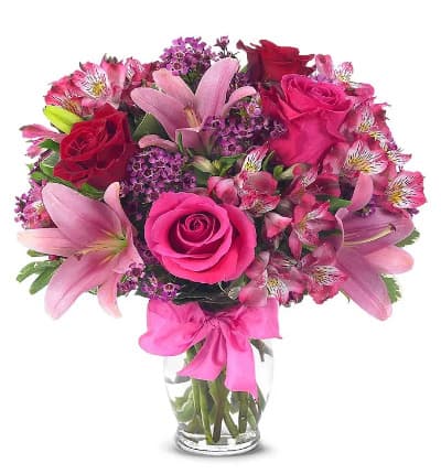 * Pink Asiatic Lilies
* Pink and Red Roses
* Purple Waxflowers
* Alstroemeria