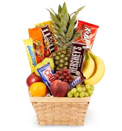Orchard fresh fruits and classic creamy chocolates? Count me in! By sending the Fresh Fruit and Chocolate Candy Gift Basket, you are sending a guaranteed smile to your special recipient. This gift basket makes a great gift year round for any and all occasions. Send today! Please note: fruit and chocolate contents may vary.

Includes:
* Seasonal Fresh Fruits
* Chocolate Candies
* Keepsake Basket
* Florist Delivered
* Card Included