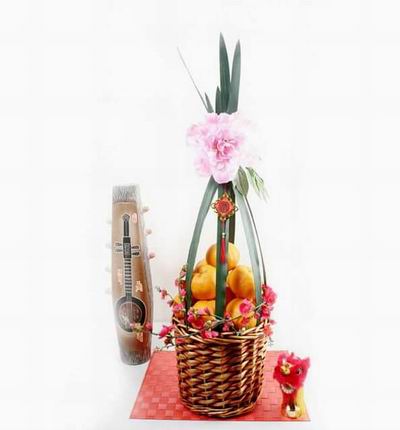 Basket of 8 Mandarin Oranges wrapped with leaves and flowers.